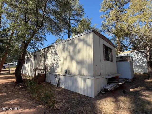 a view of backyard of house