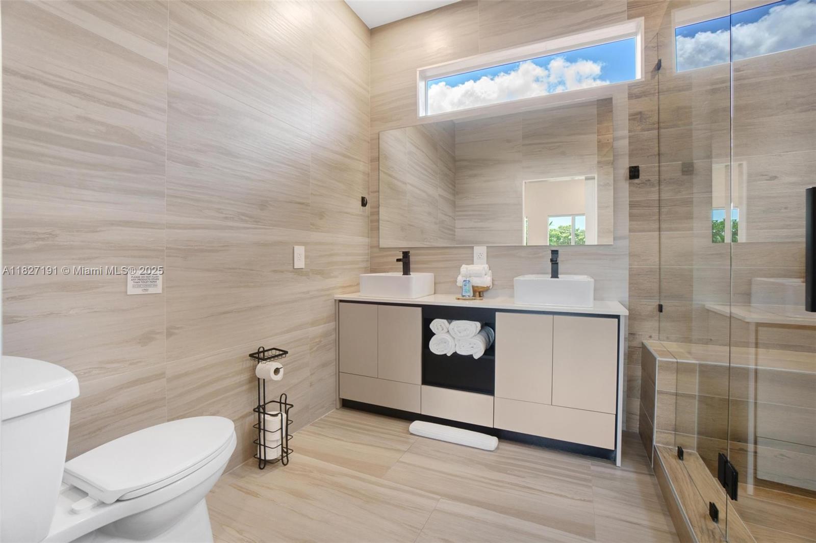 Biscayne Park Biscayne Park, FL 33161 - Photo 17 of 45 a bathroom with a sink toilet and shower