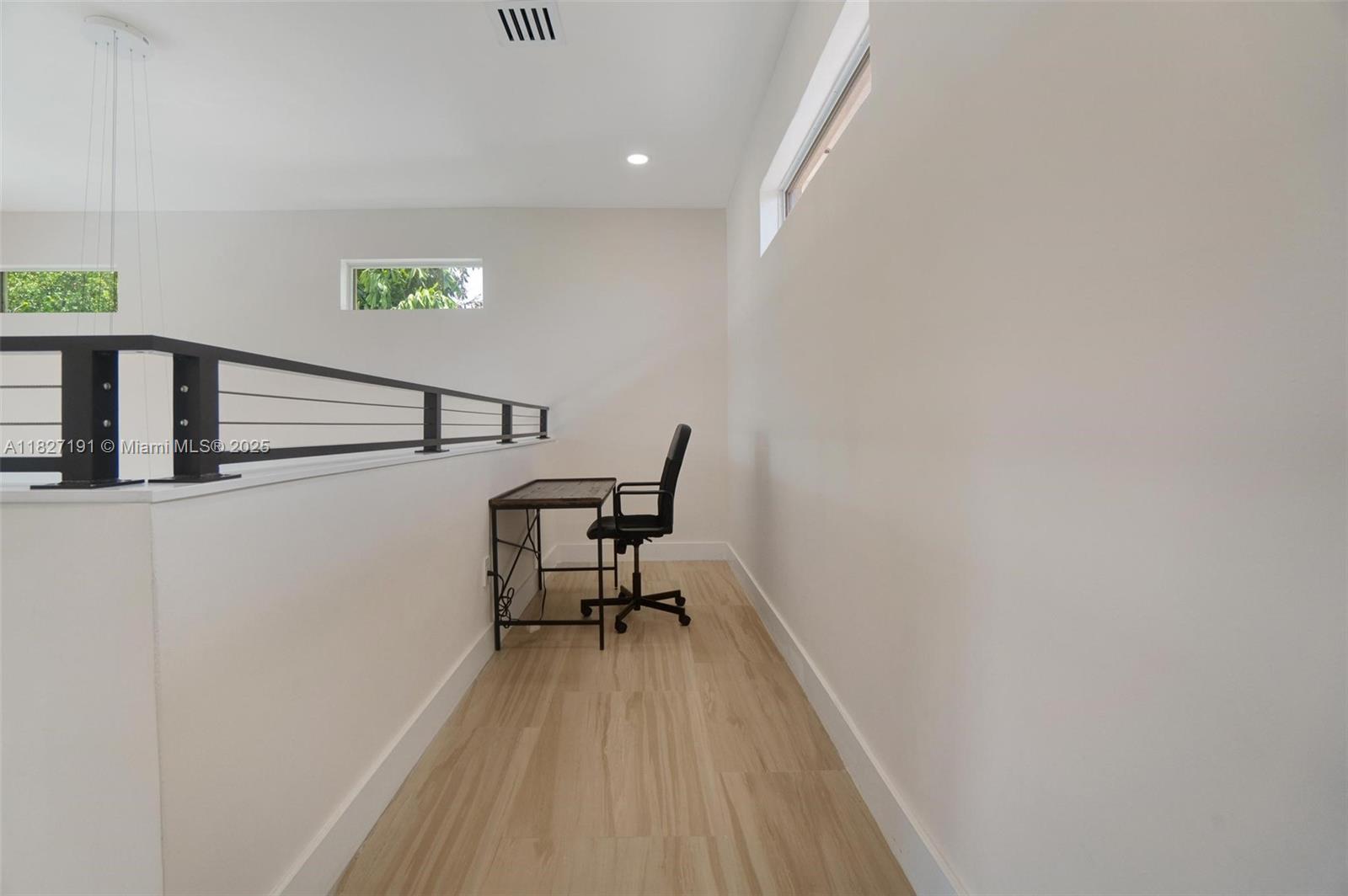 Biscayne Park Biscayne Park, FL 33161 - Photo 23 of 45 a view of a hallway with wooden floor
