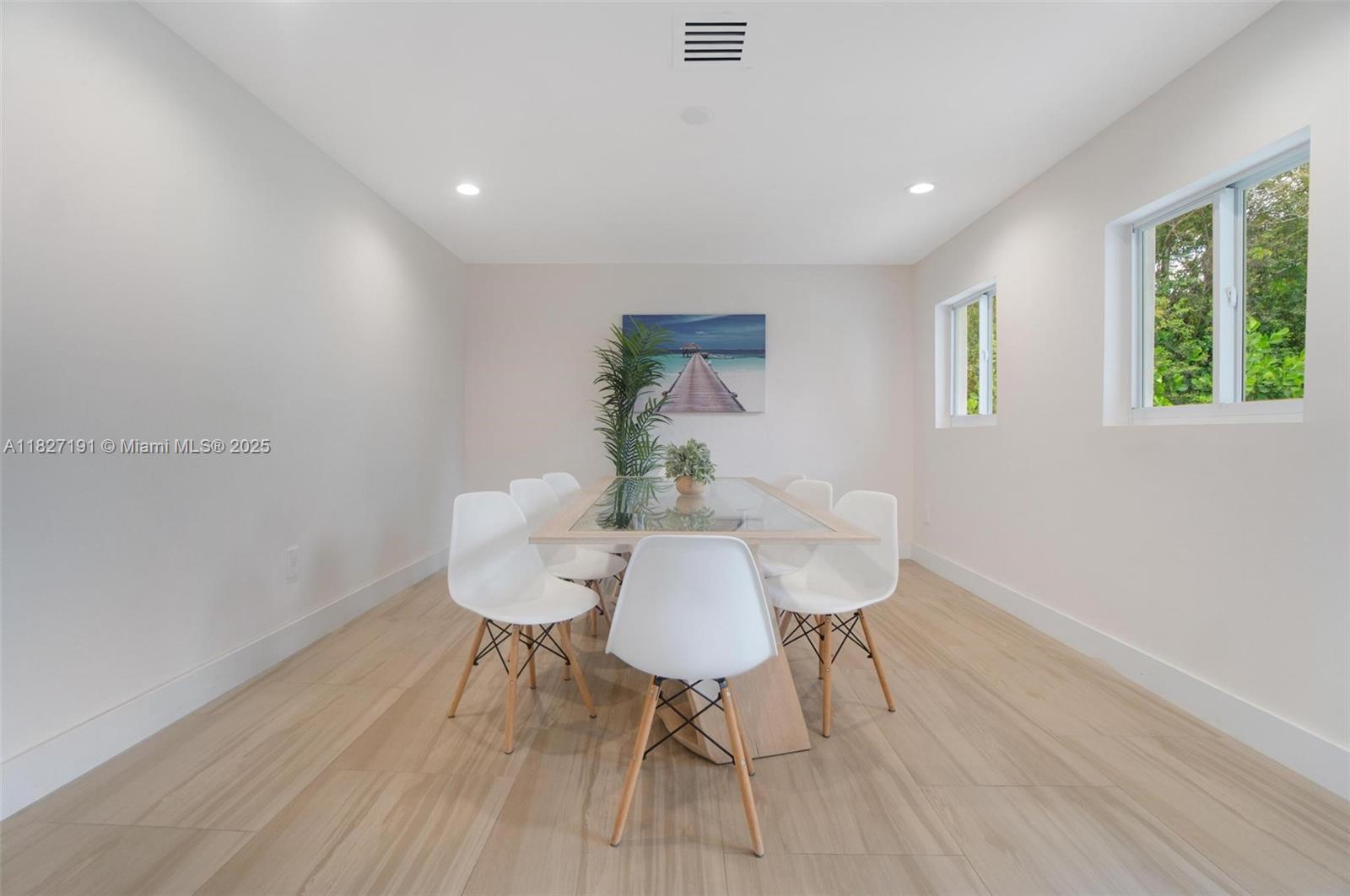 Biscayne Park Biscayne Park, FL 33161 - Photo 24 of 45 a view of a dining room with furniture and wooden floor