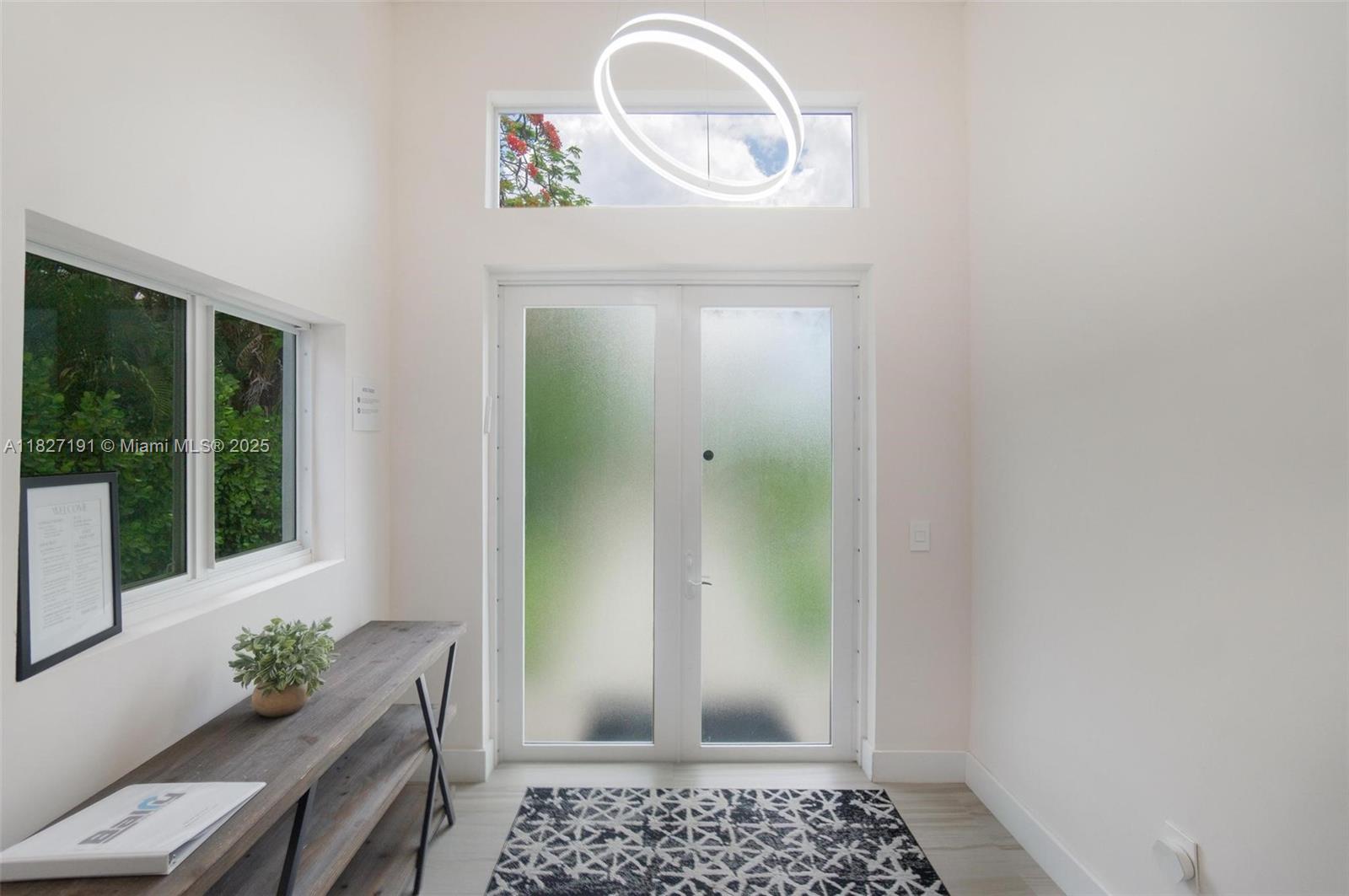 Biscayne Park Biscayne Park, FL 33161 - Photo 25 of 45 a room with painting and a potted plant