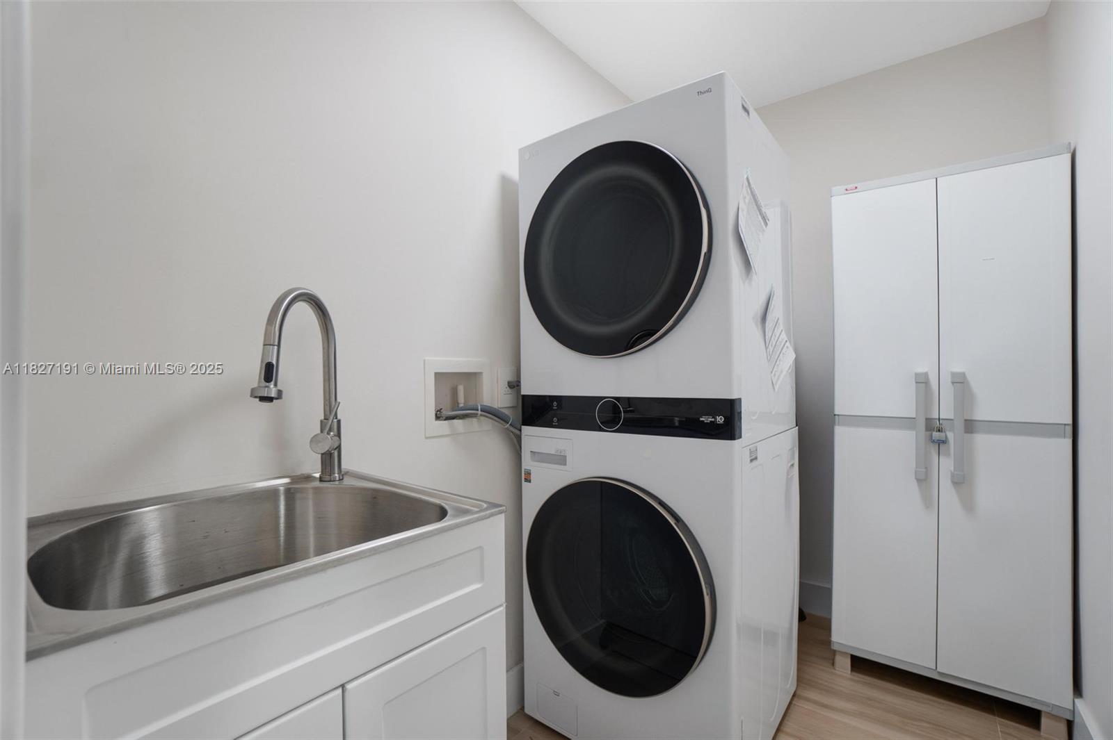 Biscayne Park Biscayne Park, FL 33161 - Photo 27 of 45 a close view of a sink and a washer in a room