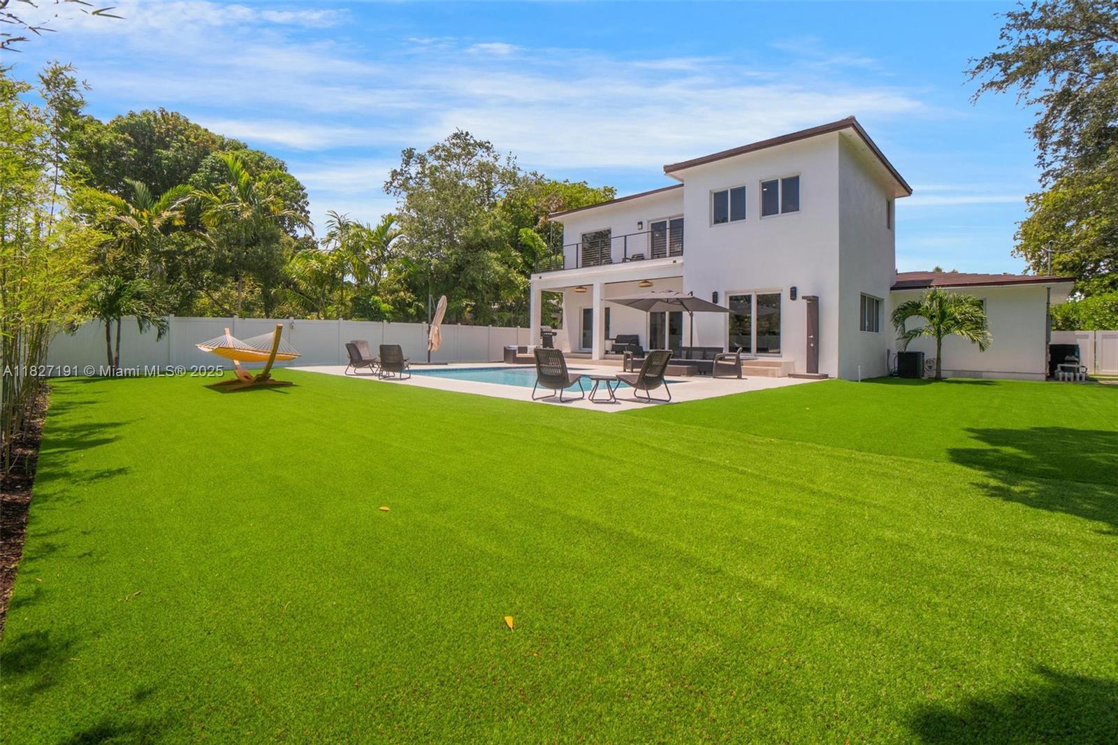 Biscayne Park Biscayne Park, FL 33161 - Photo 39 of 45 a view of a house with a yard and sitting area