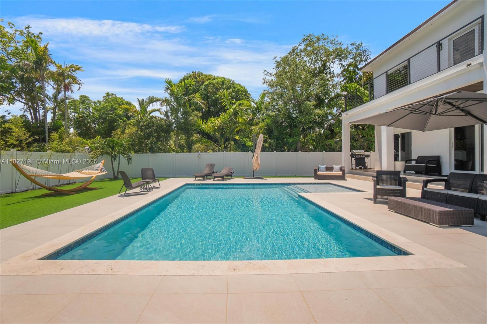 Biscayne Park Biscayne Park, FL 33161 - Photo 40 of 45 a view of swimming pool with outdoor seating