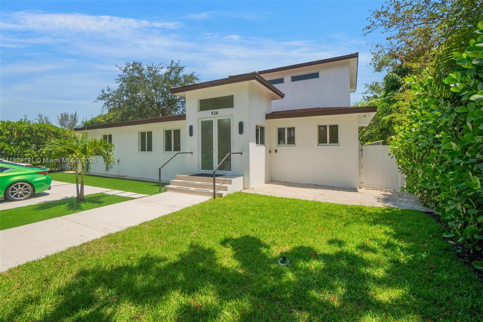 Biscayne Park Biscayne Park, FL 33161 - Photo 4 of 45 a front view of house with yard and green space
