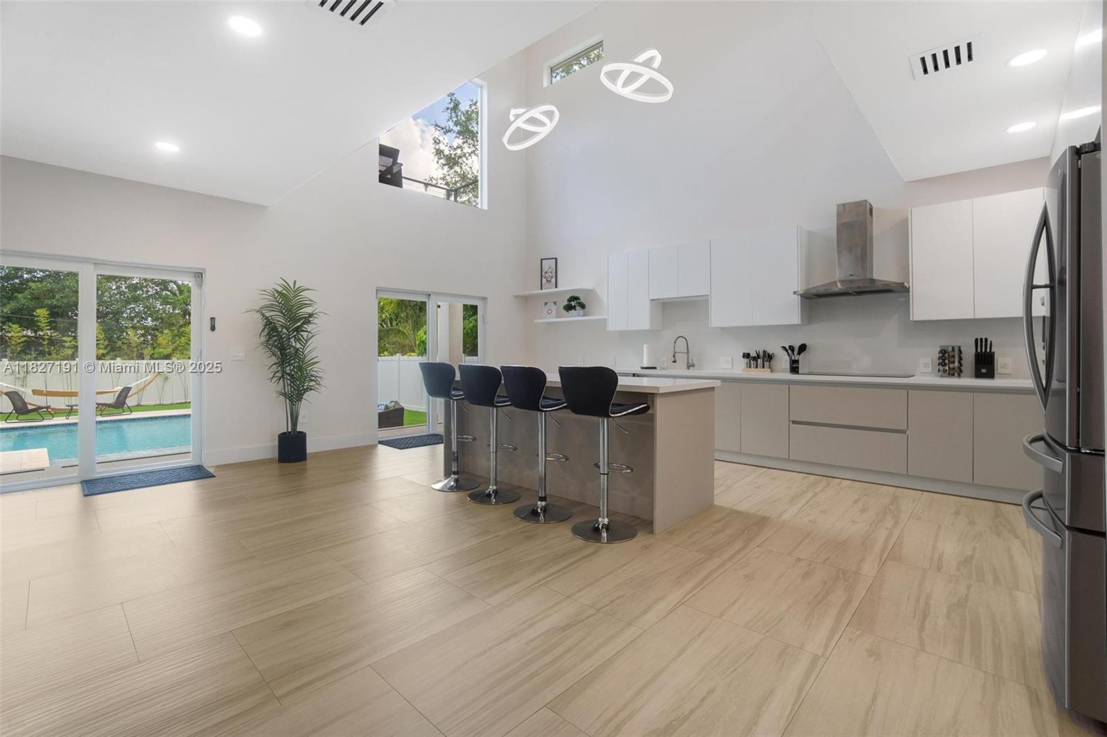 Biscayne Park Biscayne Park, FL 33161 - Photo 7 of 45 a view of a kitchen and dining room