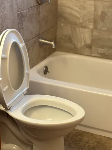 a bathroom with a sink and toilet