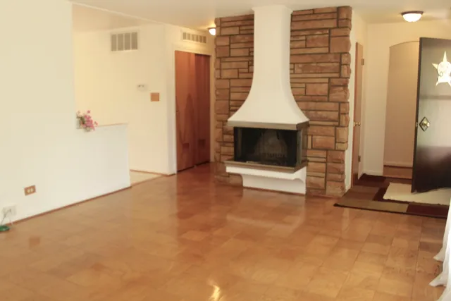 a kitchen with a stove a refrigerator and a stove