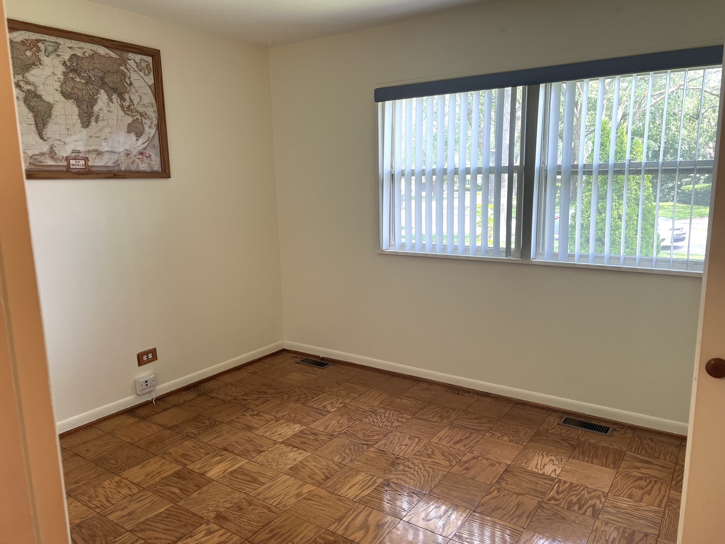 1060 Warwick Lane Elk Grove Village, IL 60007 - Photo 9 of 15 an empty room with a window