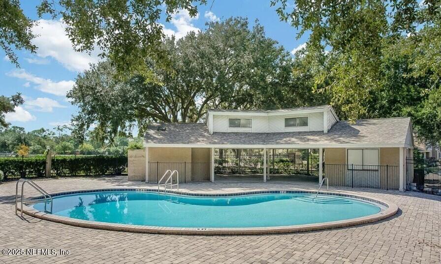 3801 Crown Point Road, Unit 1174 Jacksonville, FL 32257 - Photo 16 of 17 a view of outdoor space yard swimming pool and patio