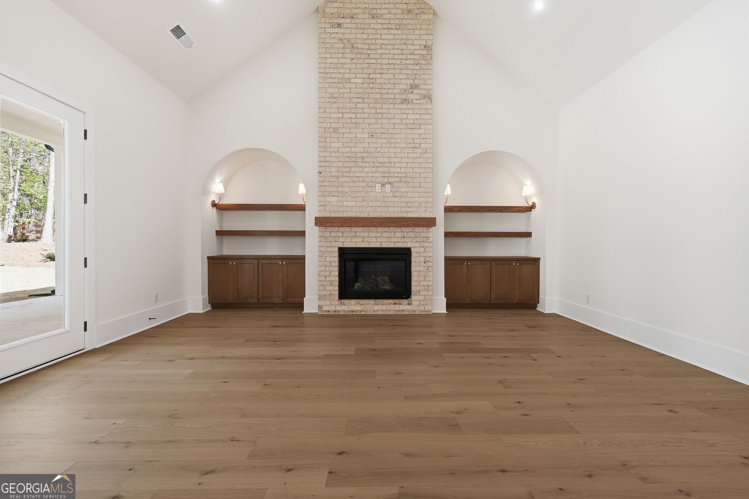 6625 Windvane Point Clermont, GA 30527 - Photo 17 of 45 an empty room with windows