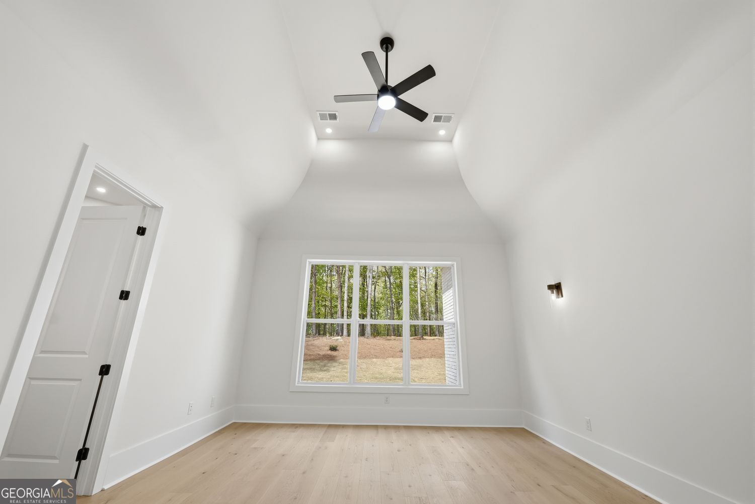 6625 Windvane Point Clermont, GA 30527 - Photo 28 of 45 an empty room with a window