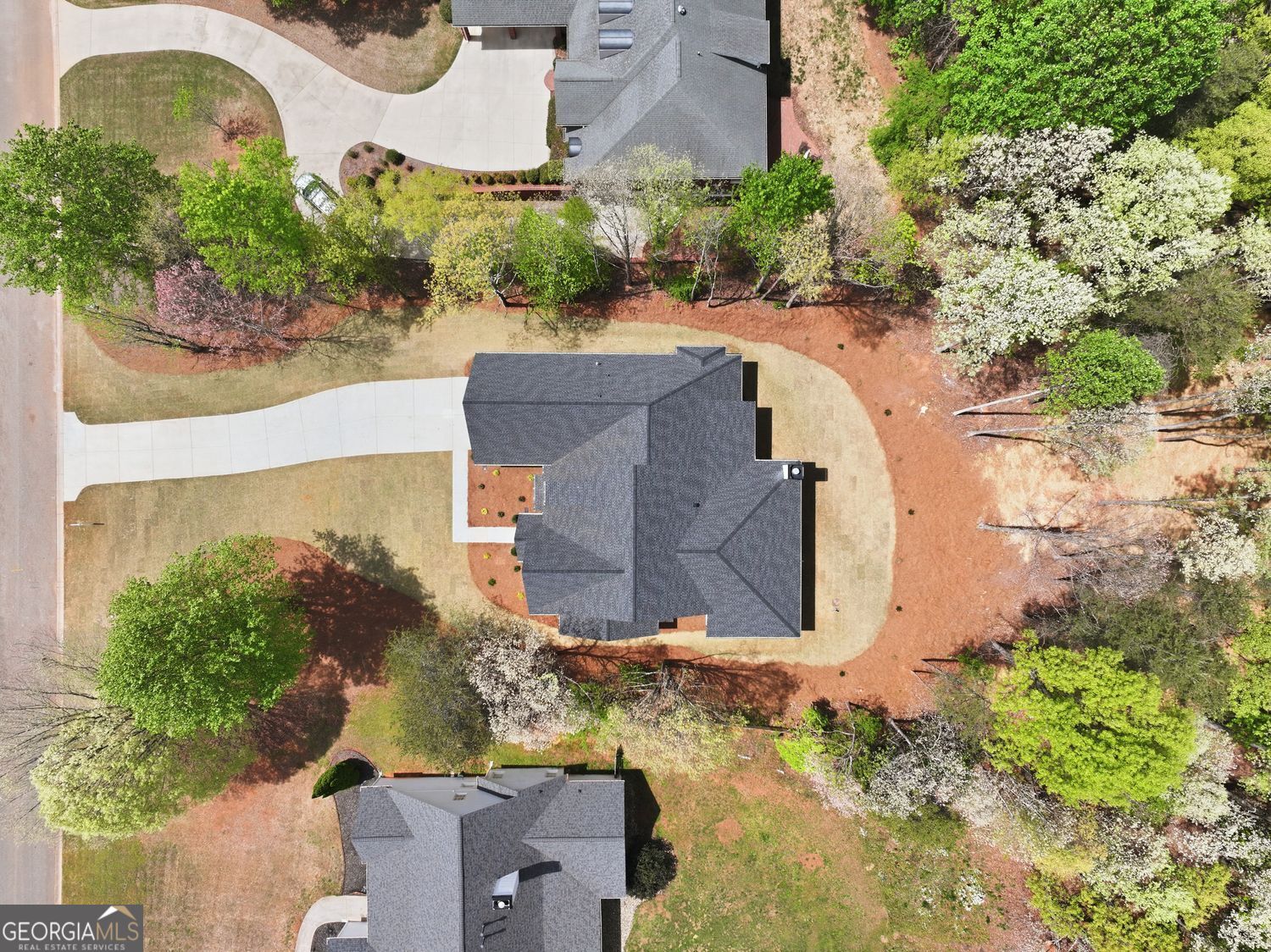 6625 Windvane Point Clermont, GA 30527 - Photo 3 of 45 an aerial view of a house with a yard