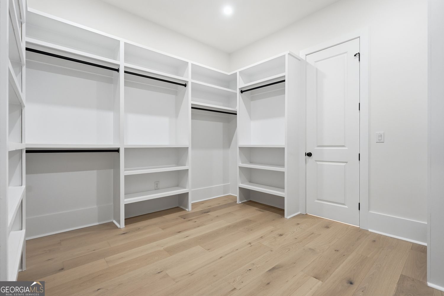 6625 Windvane Point Clermont, GA 30527 - Photo 32 of 45 a view of an empty walk in closet