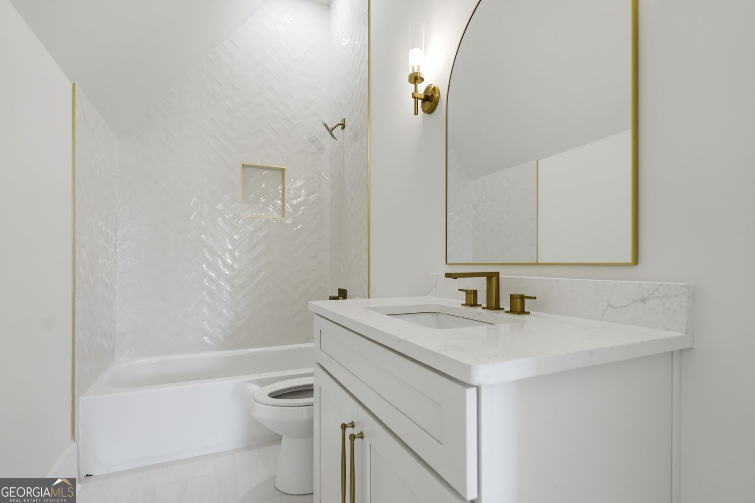 6625 Windvane Point Clermont, GA 30527 - Photo 36 of 45 a bathroom with a sink toilet vanity and shower