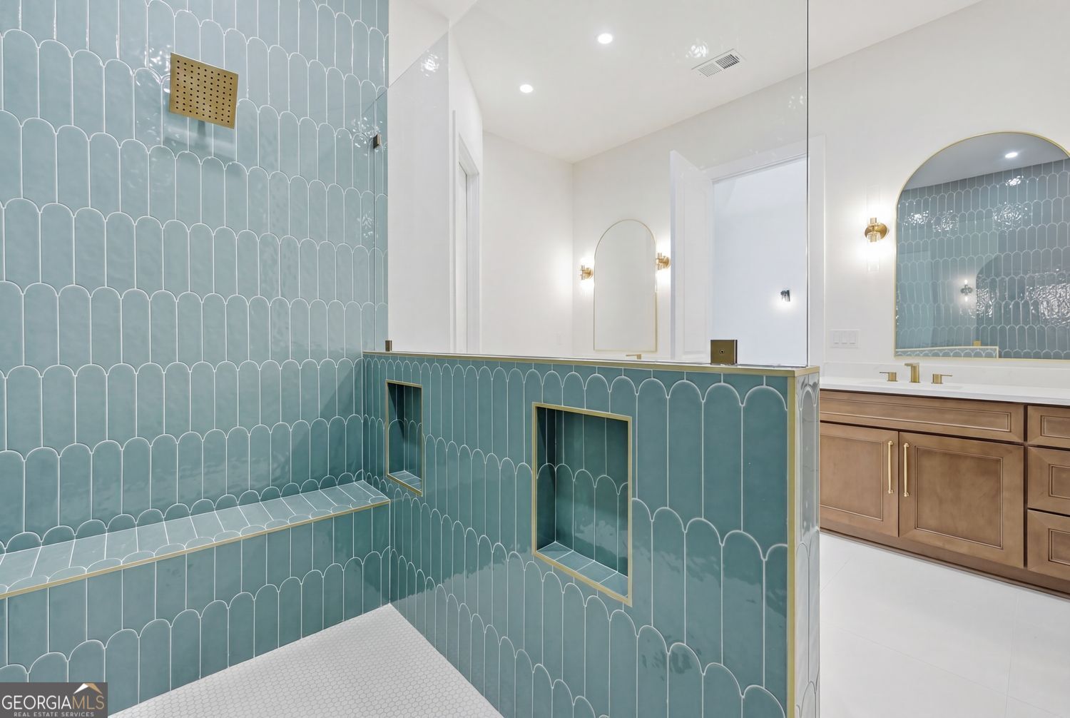 6625 Windvane Point Clermont, GA 30527 - Photo 41 of 45 a bathroom with a sink a toilet and shower