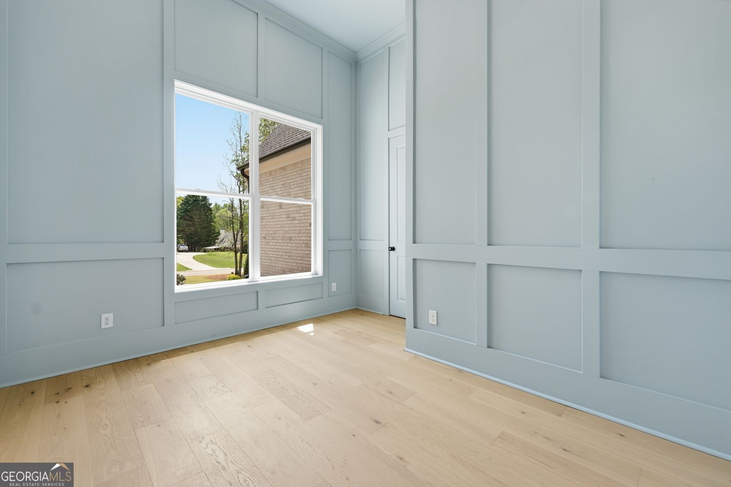 6625 Windvane Point Clermont, GA 30527 - Photo 7 of 45 a view of an empty room with a window