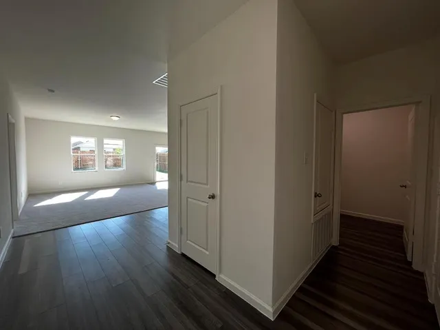 an empty room with windows