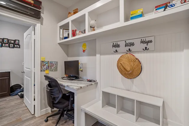 a view of a workspace with furniture