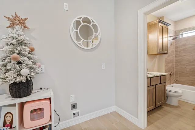 a bathroom with a toilet and a sink