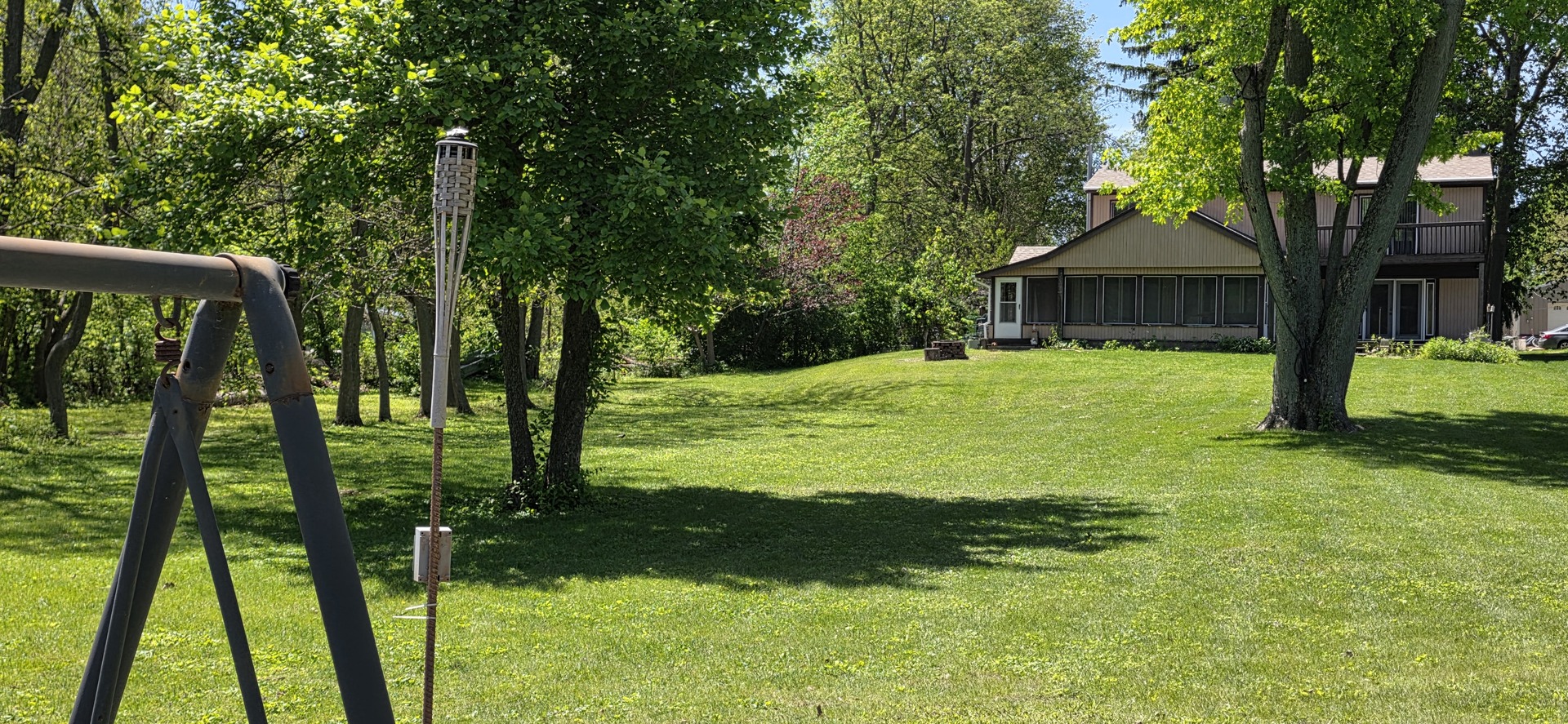 2857 River Road Kankakee, IL 60901 - Photo 26 of 35 a view of a backyard with large trees