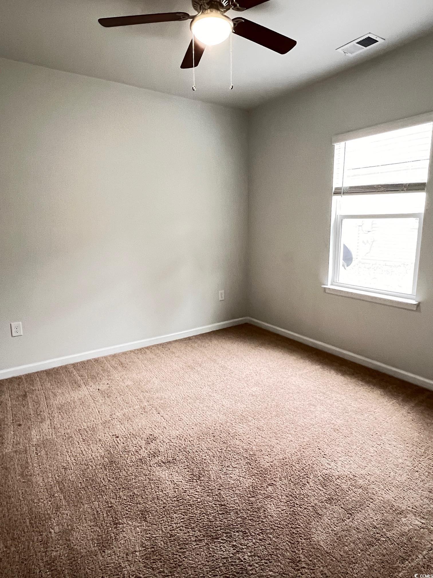 3320 Candytuft Drive Conway, SC 29526 - Photo 19 of 19 Spare room with carpet flooring and a ceiling fan