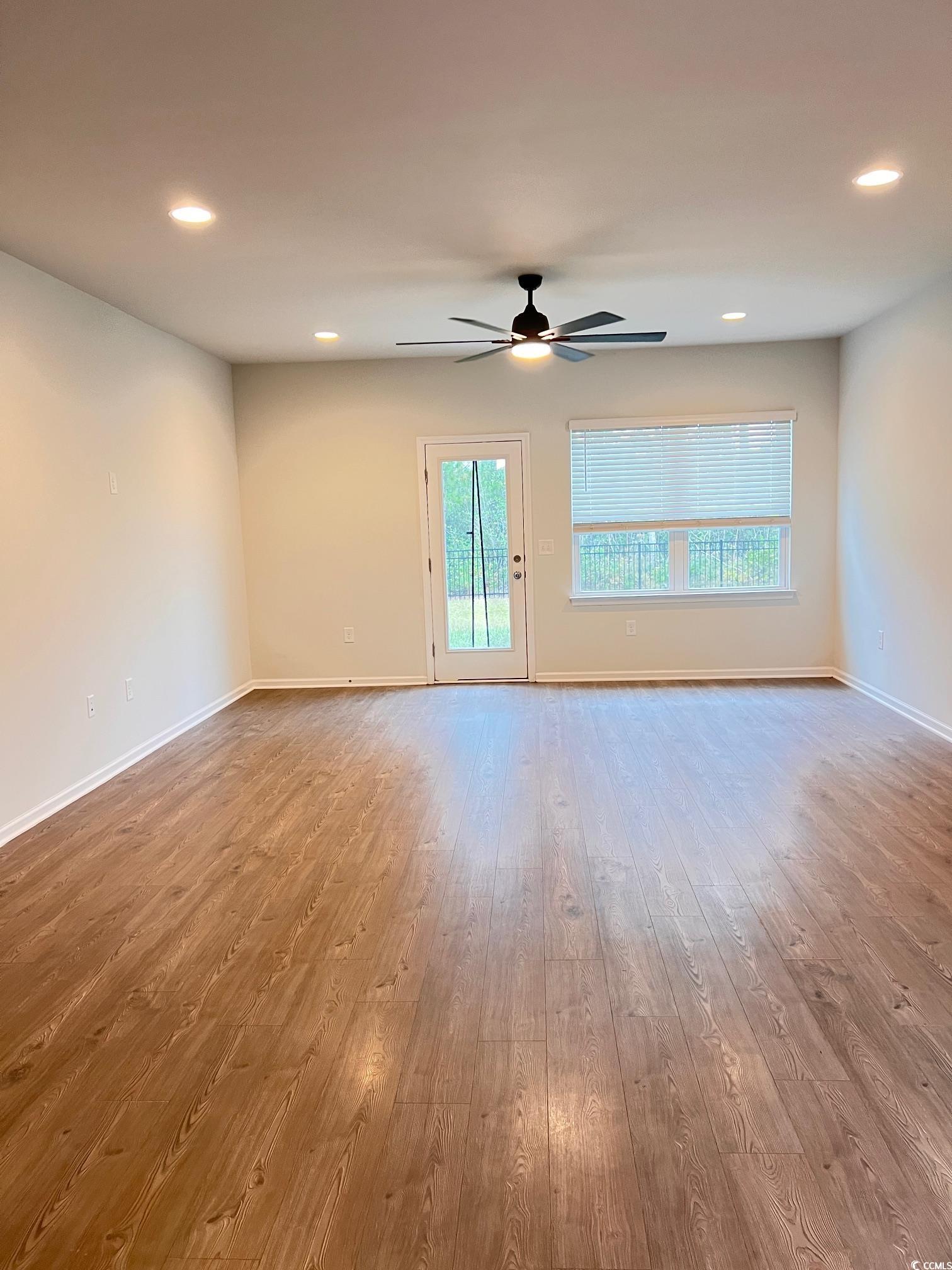3320 Candytuft Drive Conway, SC 29526 - Photo 7 of 19 Unfurnished room featuring recessed lighting, light wood-style flooring, and ceiling fan