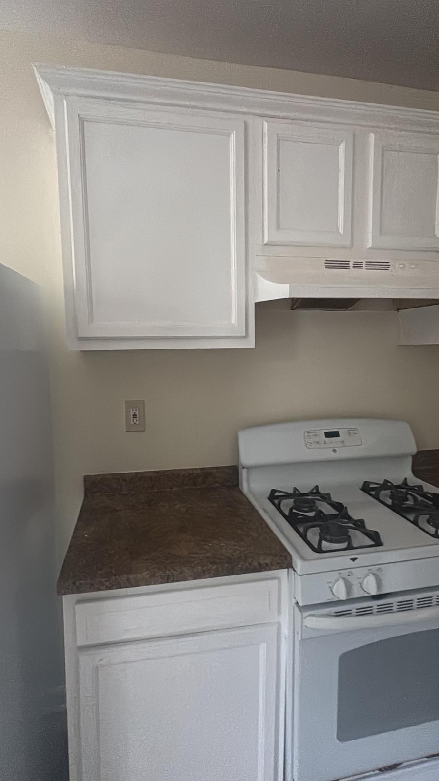 1020 Hancock Avenue, Unit 2 Bridgeport, CT 06605 - Photo 1 of 5 a stove top oven sitting inside of a kitchen