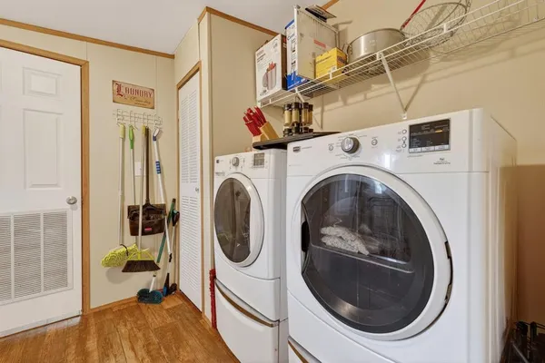 a view of a storage & utility room with washer and dryer