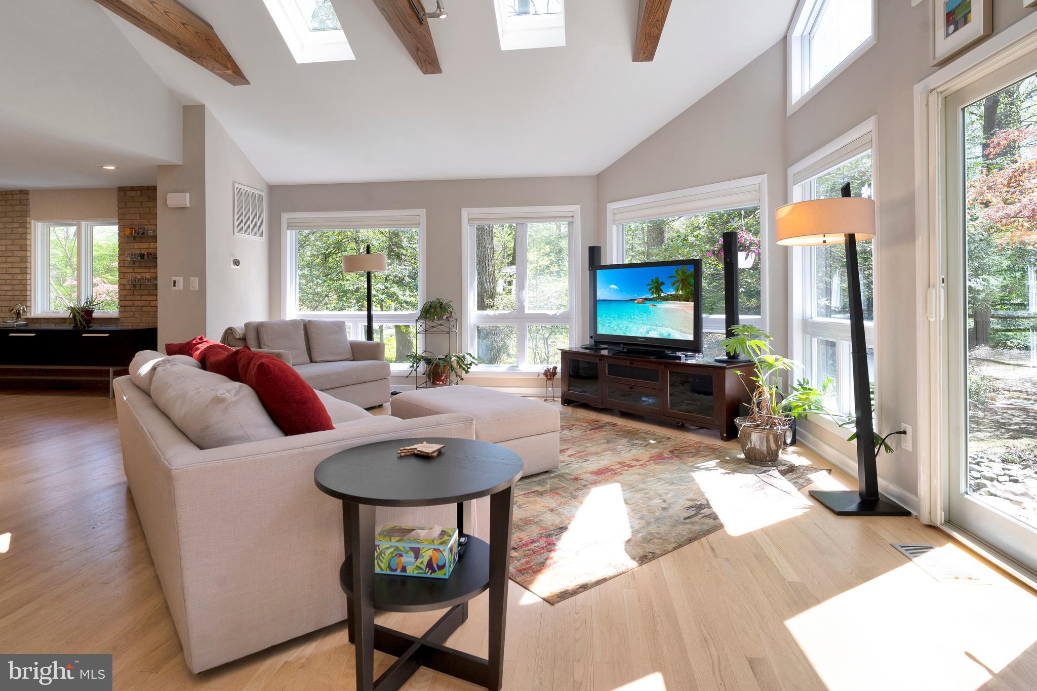 3214 Foxvale Drive Oakton, VA 22124 - Photo 15 of 56 a living room with furniture and a flat screen tv