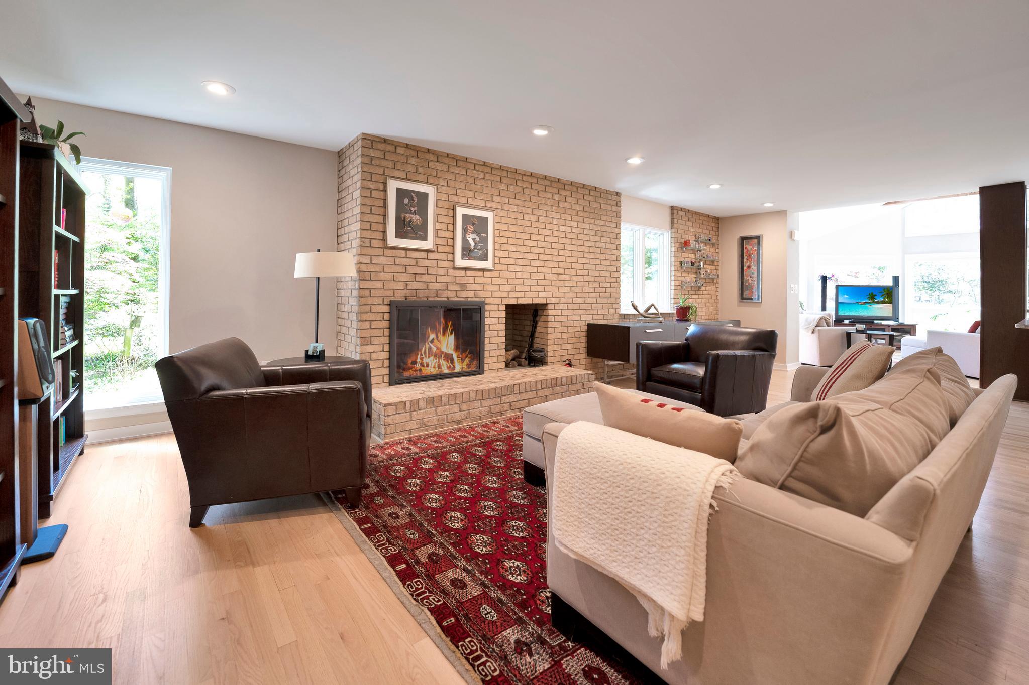 3214 Foxvale Drive Oakton, VA 22124 - Photo 18 of 56 a living room with furniture and a flat screen tv