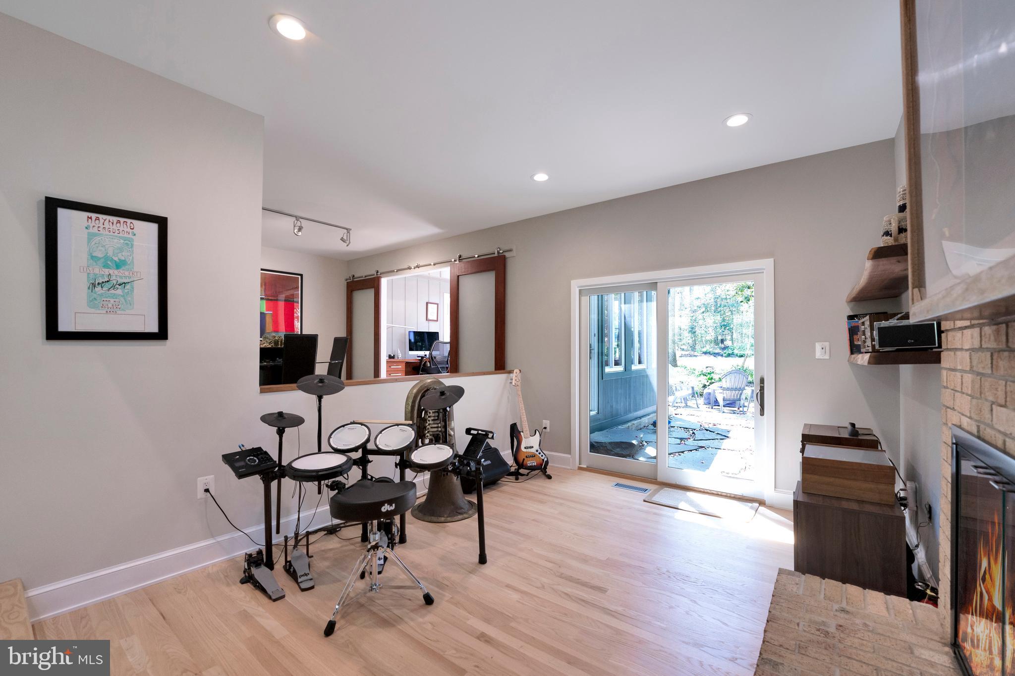 3214 Foxvale Drive Oakton, VA 22124 - Photo 22 of 56 a living room with furniture and a fireplace