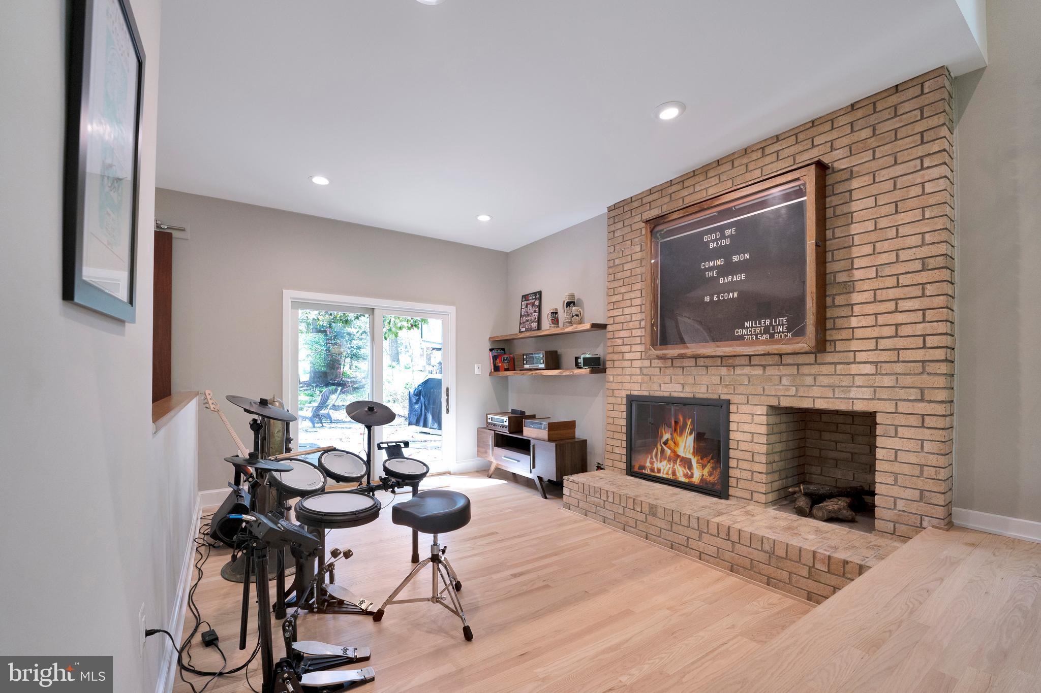 3214 Foxvale Drive Oakton, VA 22124 - Photo 23 of 56 a living room with furniture and a fireplace