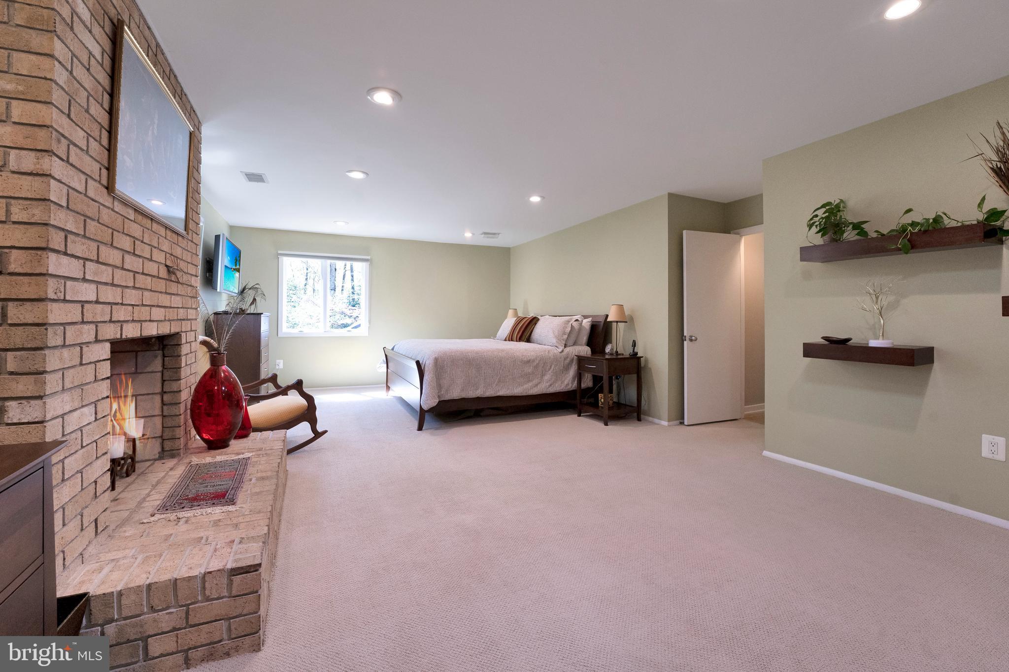3214 Foxvale Drive Oakton, VA 22124 - Photo 24 of 56 a living room with furniture and a fireplace