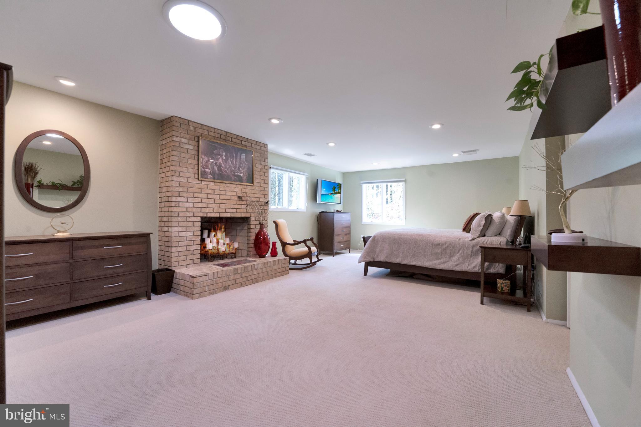 3214 Foxvale Drive Oakton, VA 22124 - Photo 25 of 56 a living room with furniture and a fireplace