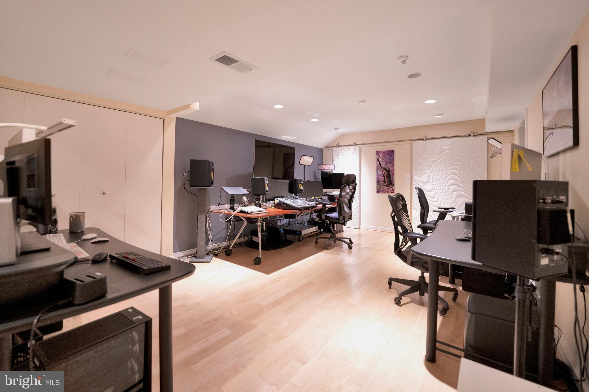 3214 Foxvale Drive Oakton, VA 22124 - Photo 40 of 56 a view of a workspace with furniture and gym equipment