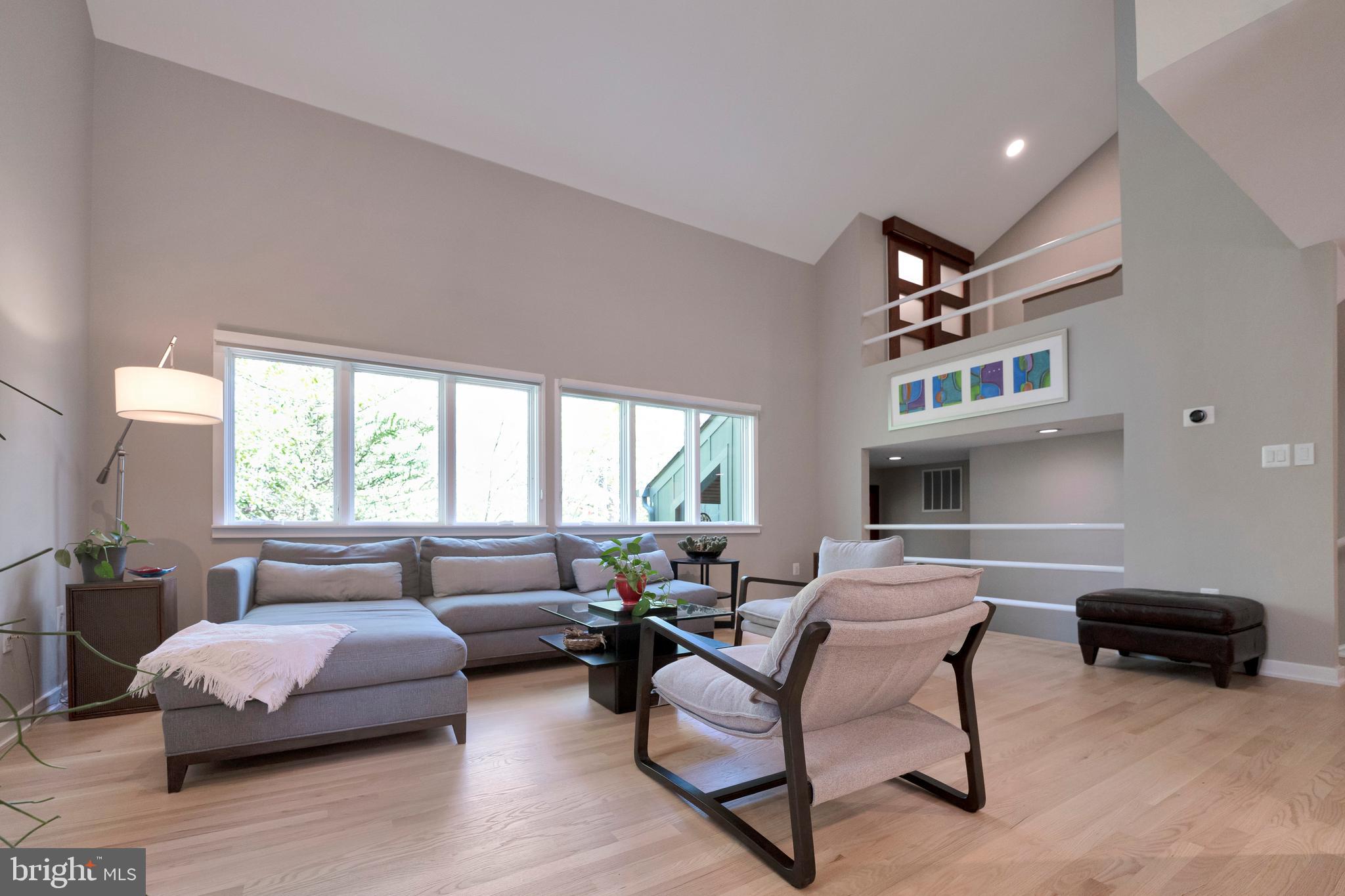3214 Foxvale Drive Oakton, VA 22124 - Photo 9 of 56 a living room with furniture and a large window