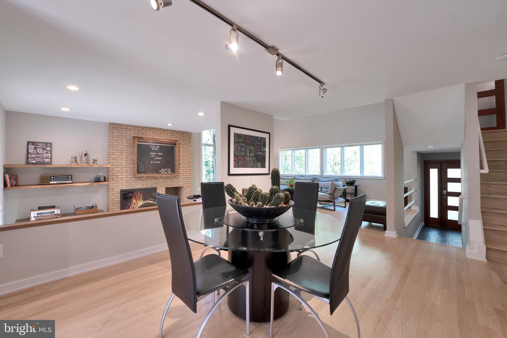 3214 Foxvale Drive Oakton, VA 22124 - Photo 10 of 56 a view of a dining room with furniture and wooden floor
