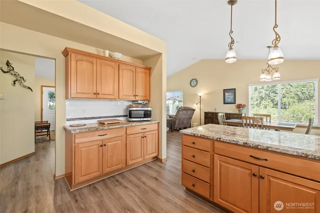 a view of a kitchen from the hallway