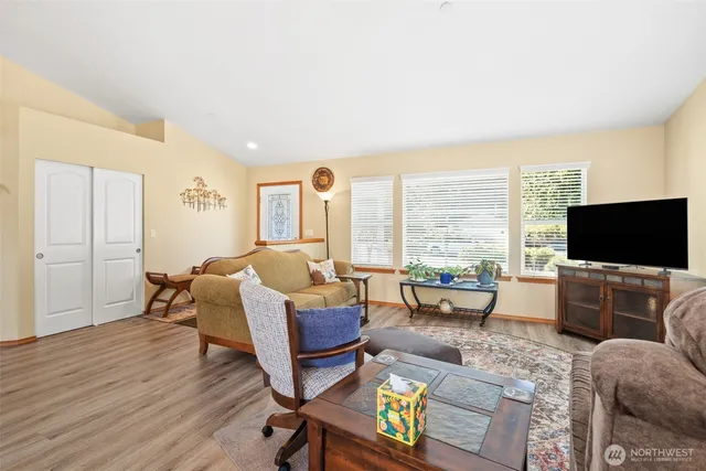a living room with furniture and a couch