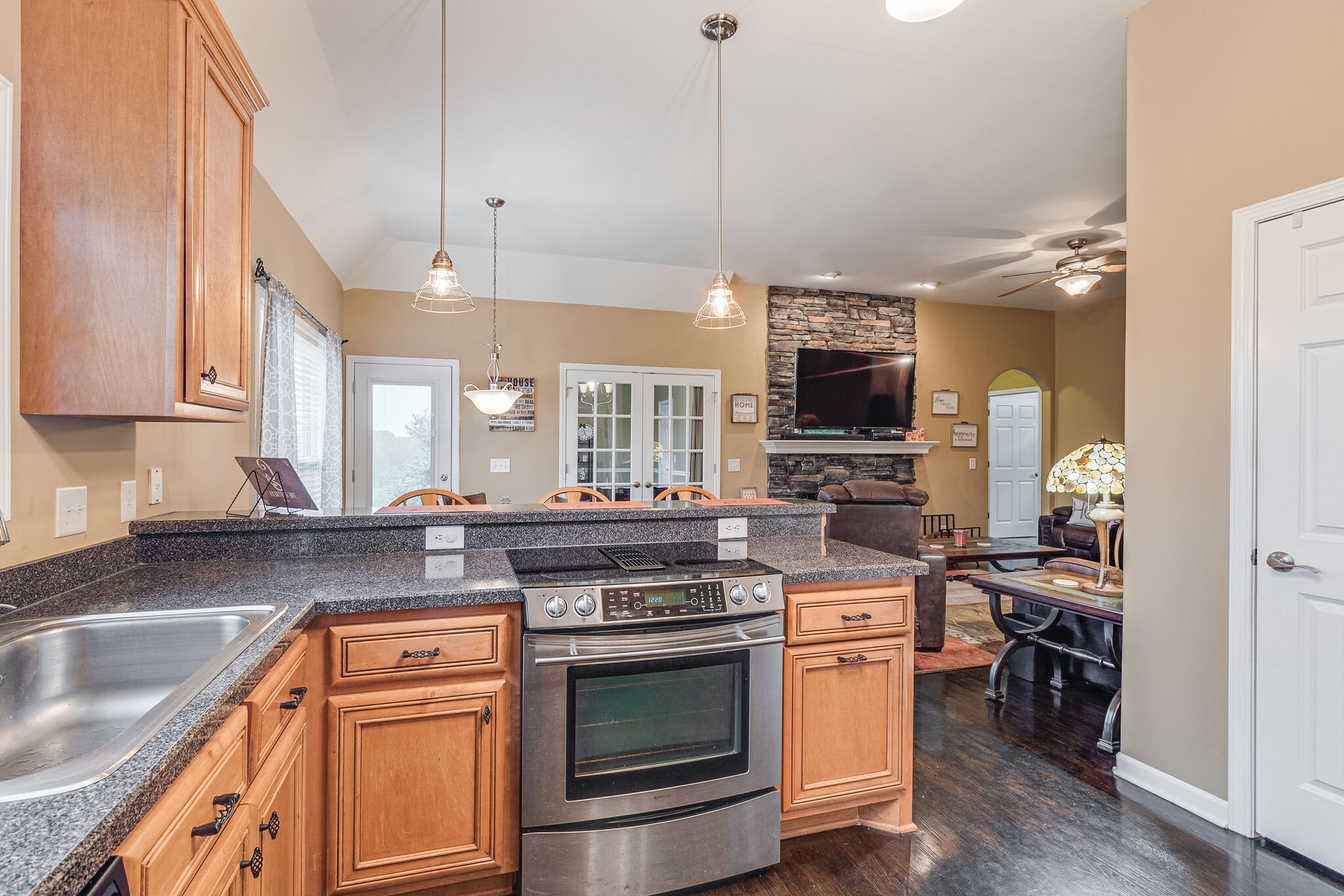 2113 Burford Road Lebanon, TN 37087 - Photo 14 of 35 a kitchen with a stove and a microwave oven