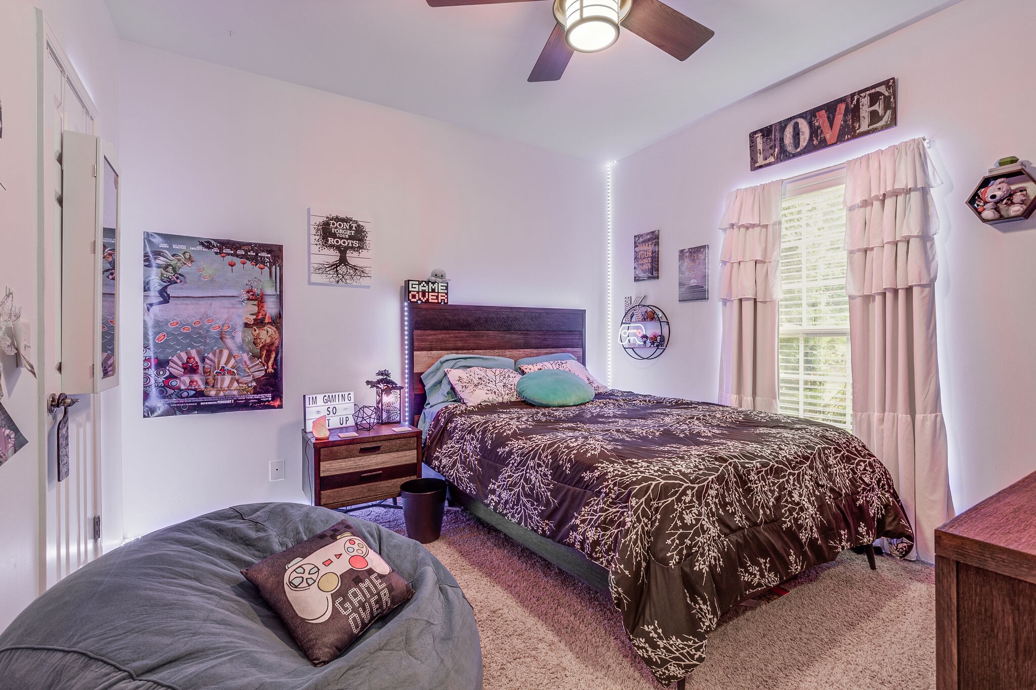 2113 Burford Road Lebanon, TN 37087 - Photo 24 of 35 a bedroom with a bed and a chandelier