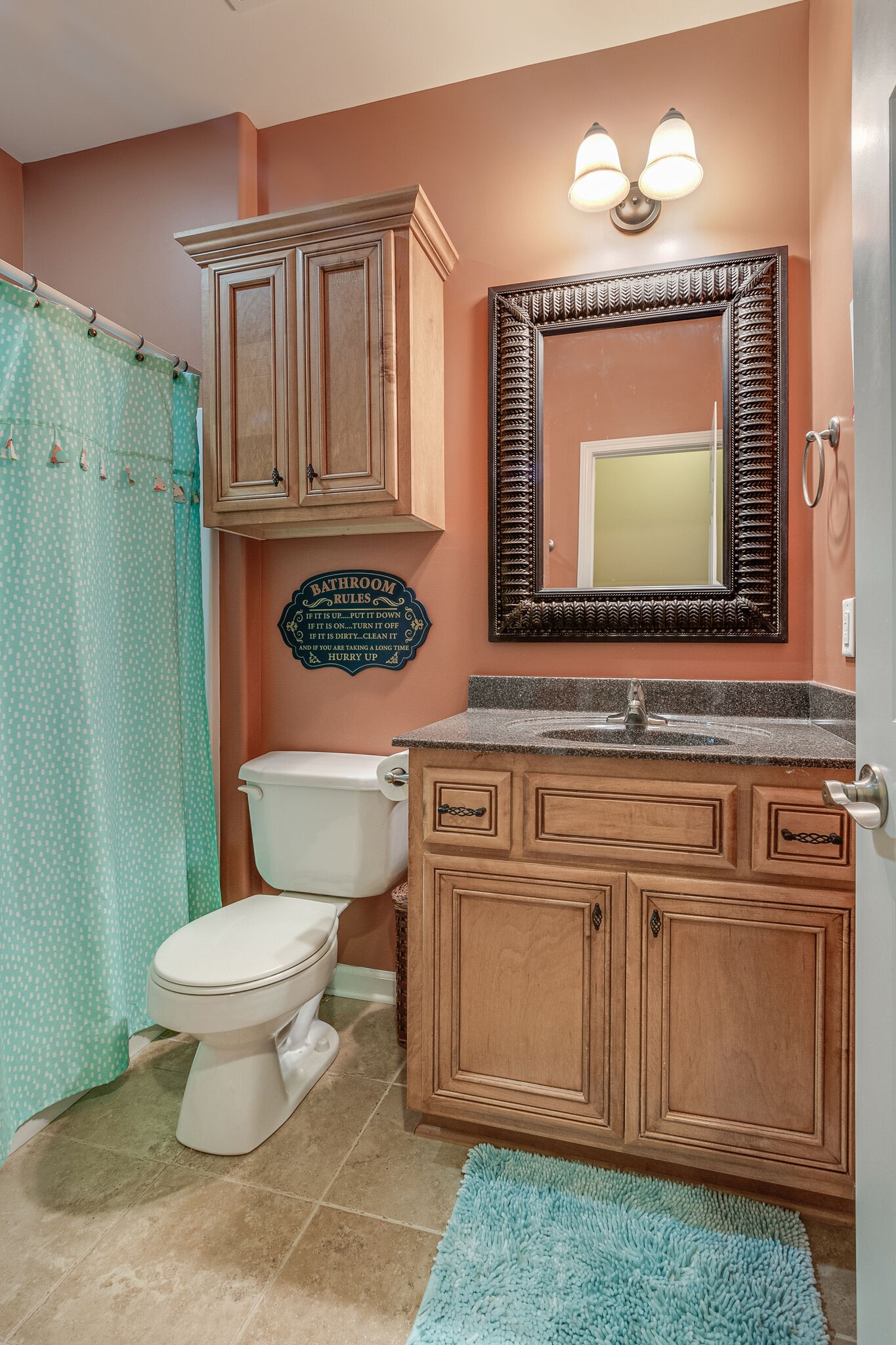 2113 Burford Road Lebanon, TN 37087 - Photo 25 of 35 a bathroom with a toilet a sink and a mirror