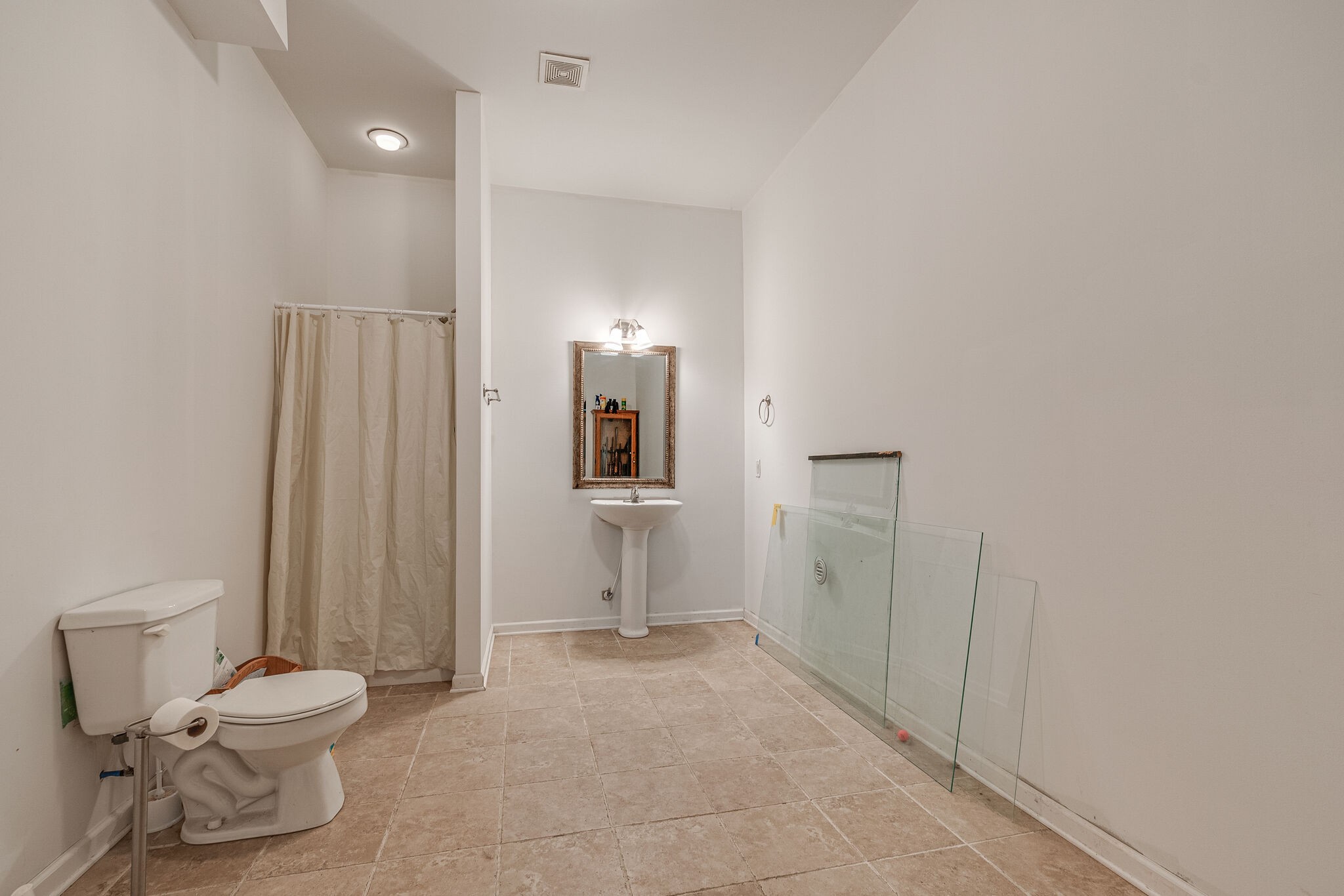 2113 Burford Road Lebanon, TN 37087 - Photo 29 of 35 a bathroom with a toilet and a shower