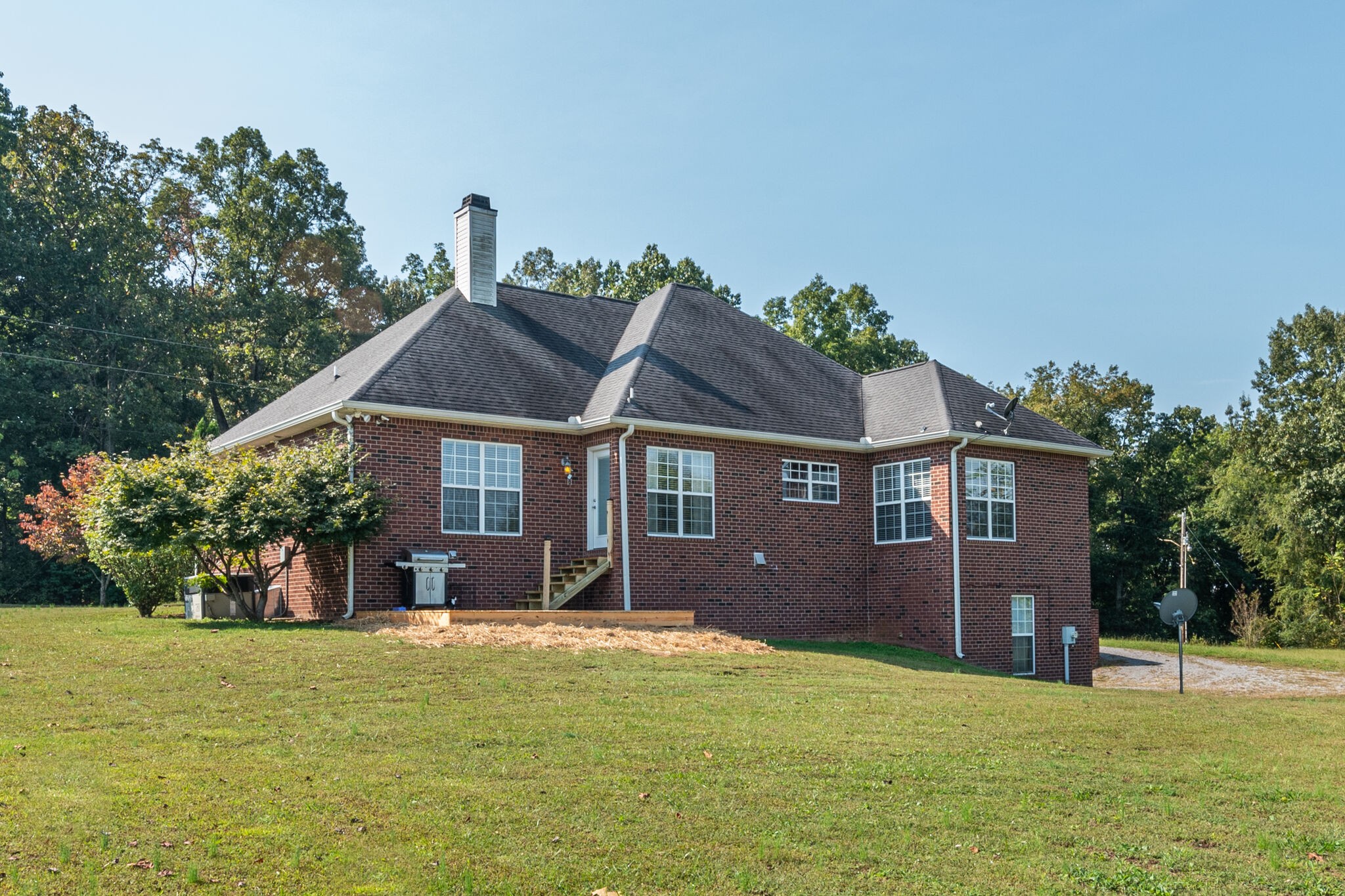 2113 Burford Road Lebanon, TN 37087 - Photo 30 of 35 a front view of a house with a garden