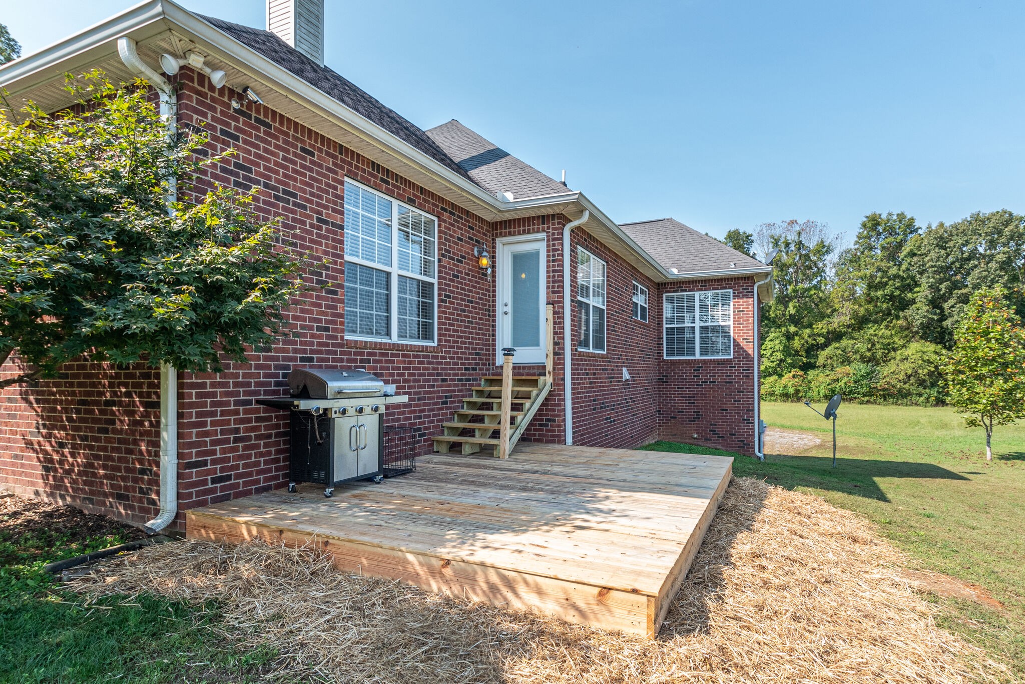 2113 Burford Road Lebanon, TN 37087 - Photo 32 of 35 a front view of a house with a yard