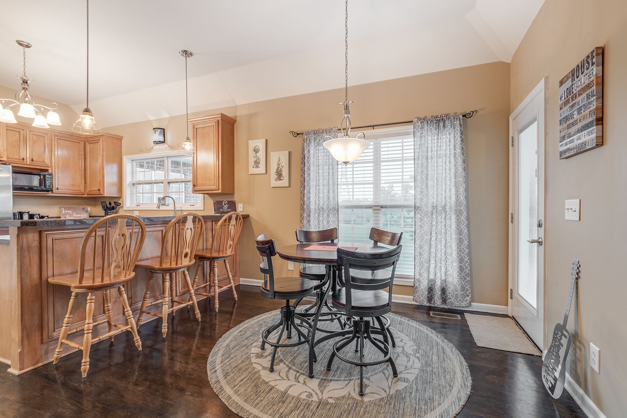 2113 Burford Road Lebanon, TN 37087 - Photo 9 of 35 a dining room with furniture a chandelier and wooden floor