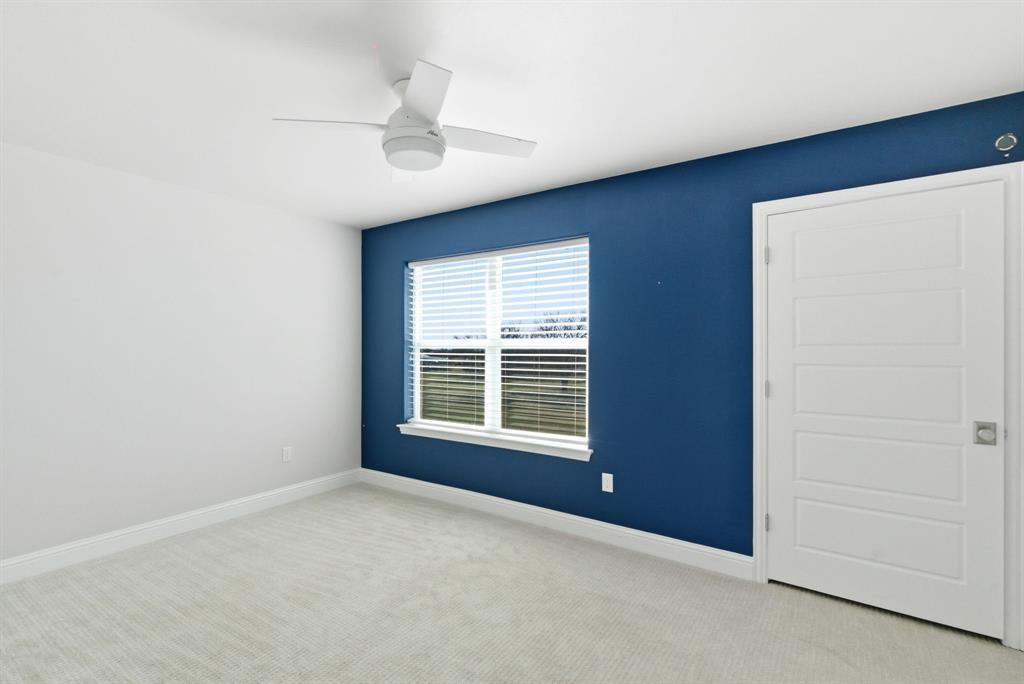 4600 A Old Brock Road Weatherford, TX 76087 - Photo 28 of 40 Unfurnished room featuring light colored carpet and a ceiling fan