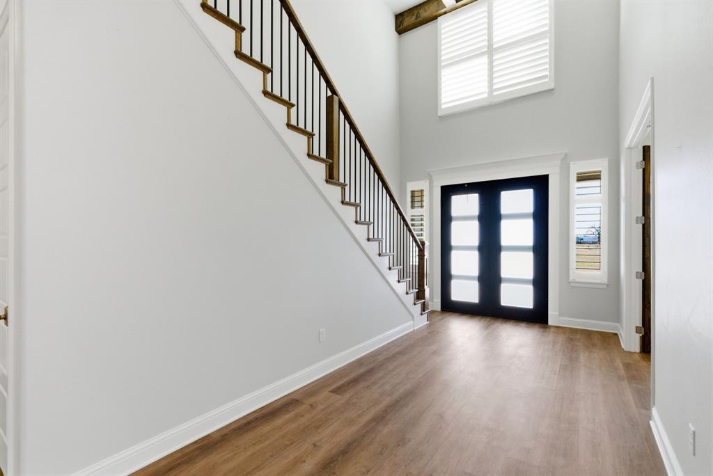 4600 A Old Brock Road Weatherford, TX 76087 - Photo 3 of 40 Foyer entrance with a high ceiling and wood finished floors