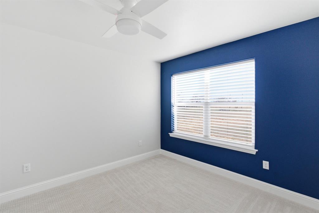 4600 A Old Brock Road Weatherford, TX 76087 - Photo 31 of 40 Spare room with light colored carpet and ceiling fan